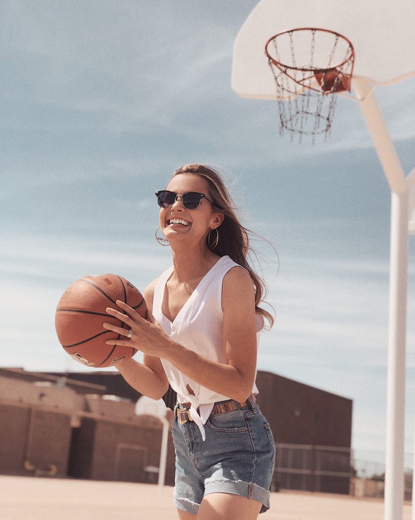 a girl with a basketball